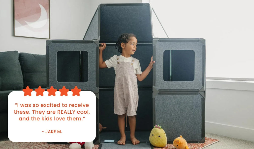 Child standing next to a Superspace build with a positive review quote, highlighting customer satisfaction with The Squares Add-On Pack by Superspace modular playsets for kids.